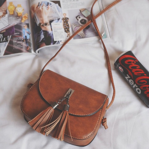 Boutique Handbags - 🆕 Tassel Faux Leather Bag